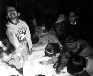 children working on a group mural during art activities